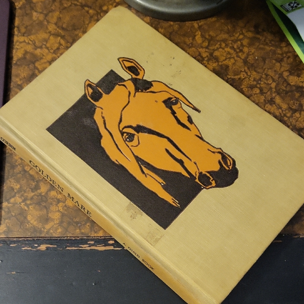 Golden Mare Tan and Black Book